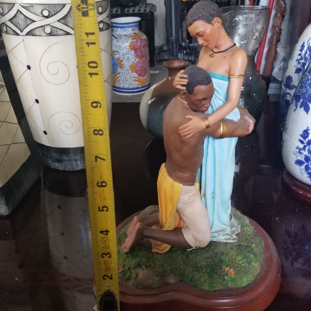 African Couple Higging Statue